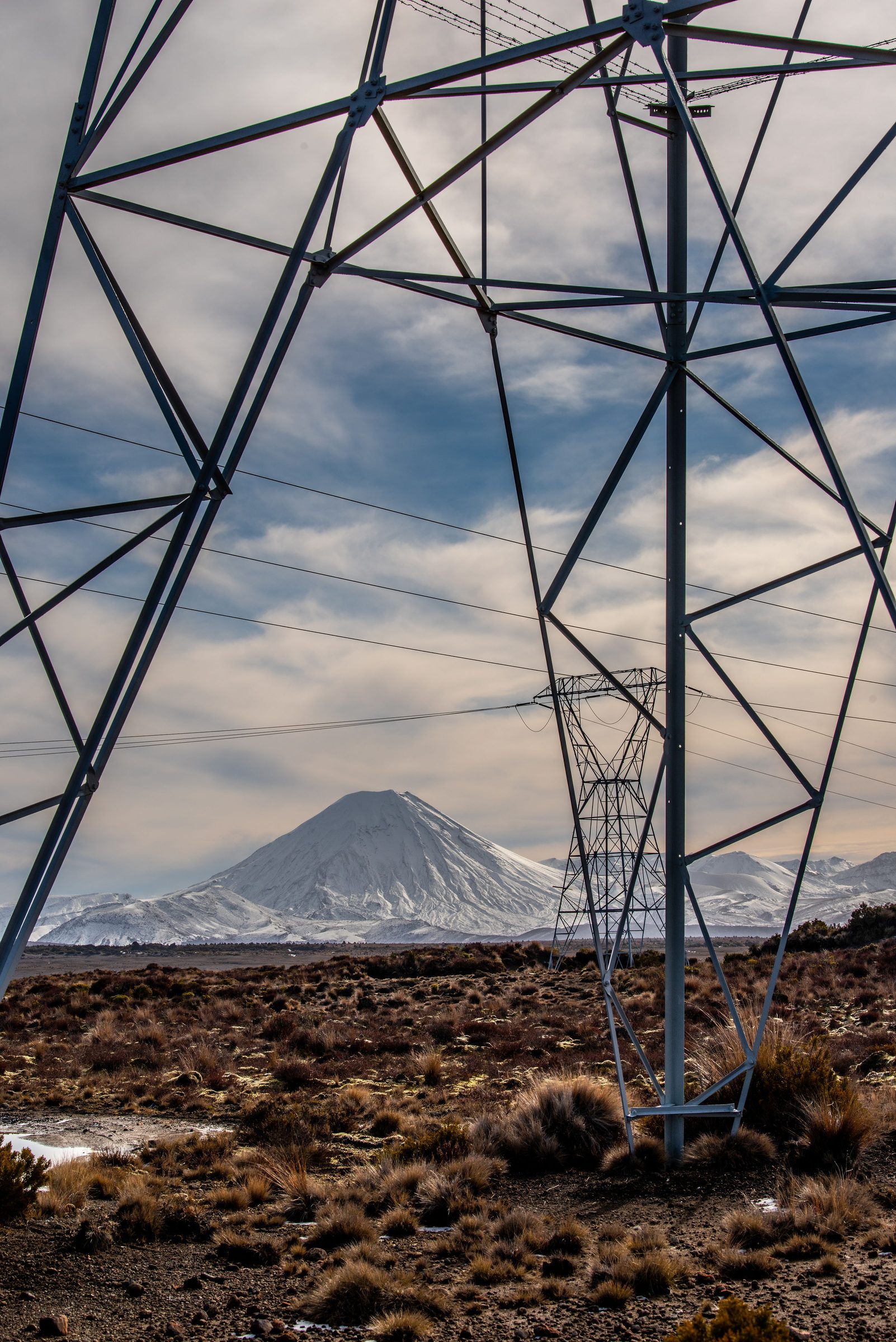 Transmission tower with Mount Ngauruhoe in the background